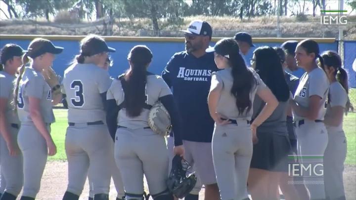 Softball Players Huddling