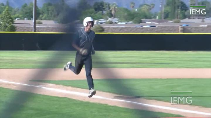 Baseball Player Running to Home Base