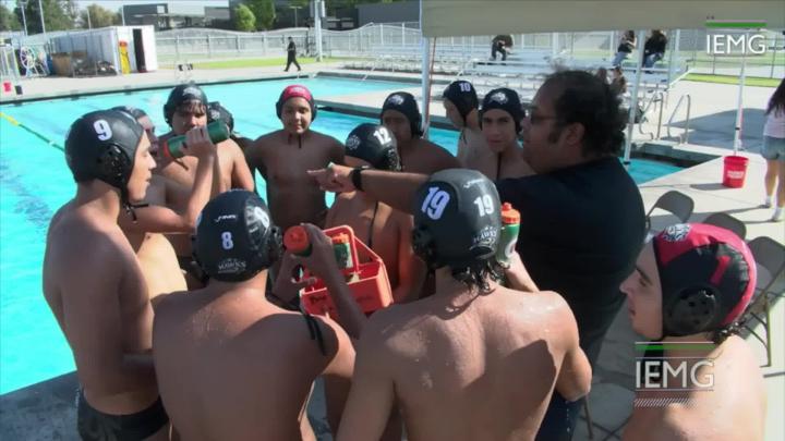 Water Polo Team Huddling Up